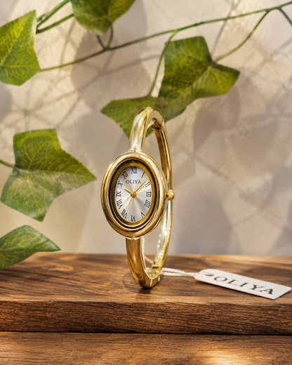 OLIYA Women's Gold Oval Bangle Watch – White Roman Numeral Dial